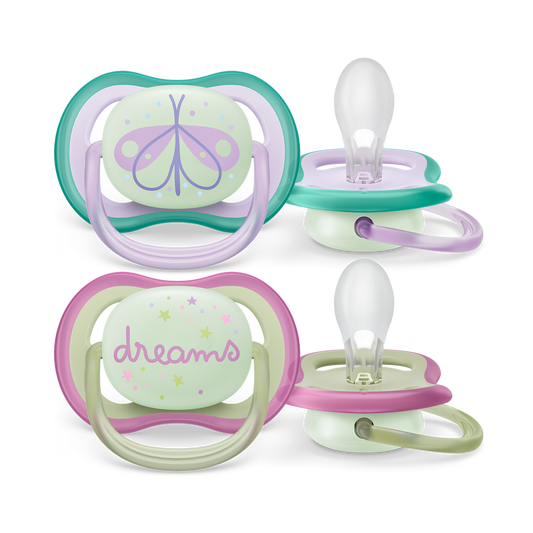 Two baby pacifiers with pastel colors and designs on a white background