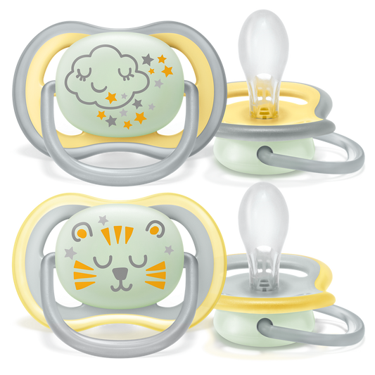 Two baby pacifiers with cloud and tiger designs on a white background