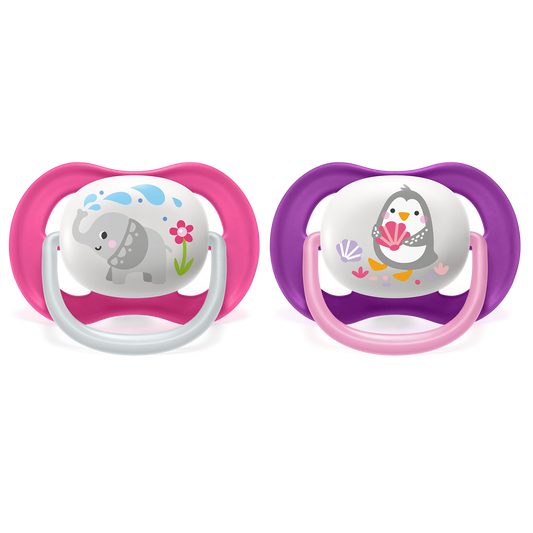 Two baby pacifiers with animal designs on a white background