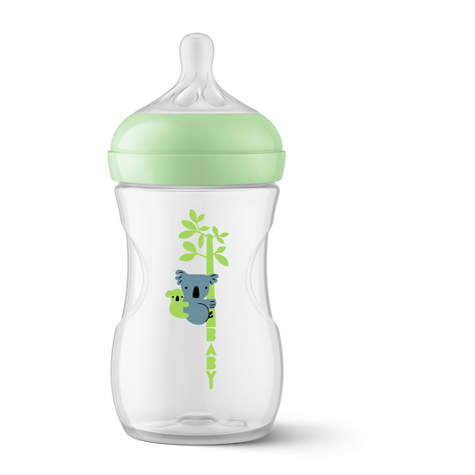 Baby bottle with green cap and koala design on a white background