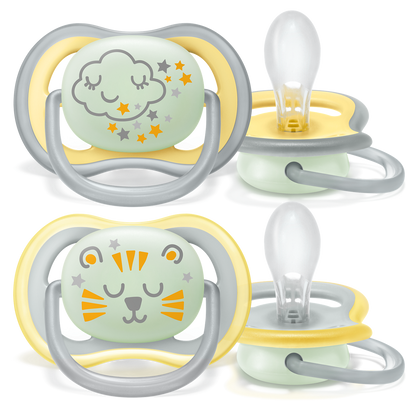 Two baby pacifiers with cloud and tiger designs on a white background