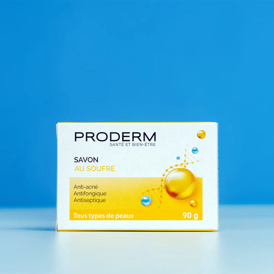Proderm soap bar packaging on a blue background