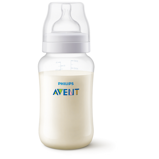 Philips Avent baby bottle with milk content on a white background